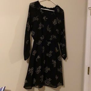 Black dress with see through sleeves. Size small and is flattering!